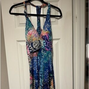Hawaiian print sleeveless midi length dress. Handkerchief hem. From Hawaii.